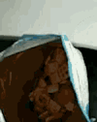 a close up of a bag of chips with a blue stripe on it