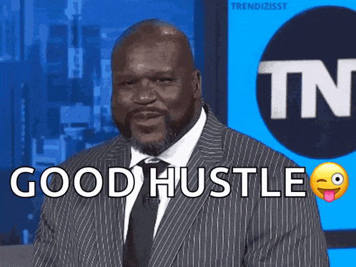 a man in a suit and tie says good hustle in front of a tnt logo