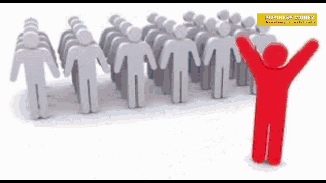 a red man is standing in front of a crowd of people with his arms outstretched