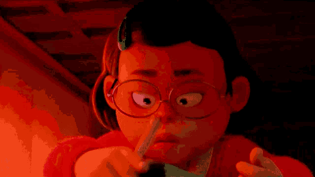 a girl with glasses is holding a pencil and making a surprised face