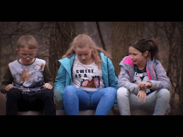 a girl wearing a shirt that says sweet as a