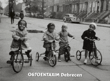 a black and white photo of children riding tricycles with the words o670entaxim debrecen above them