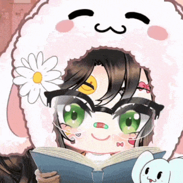 a girl wearing a sheep hat is reading a book next to a white bunny