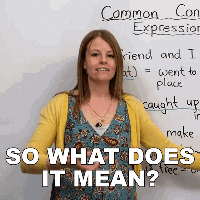 a woman stands in front of a white board with the words " so what does it mean " on it