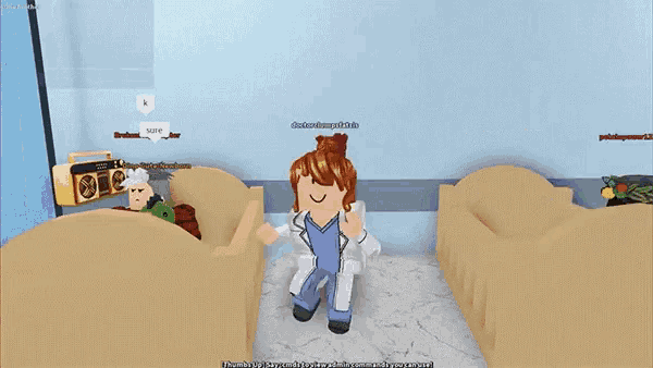 a girl in a lab coat is standing in a hospital room surrounded by other people