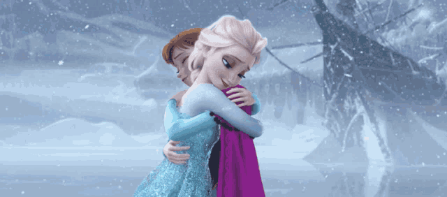 anna and elsa from frozen hugging each other in the snow