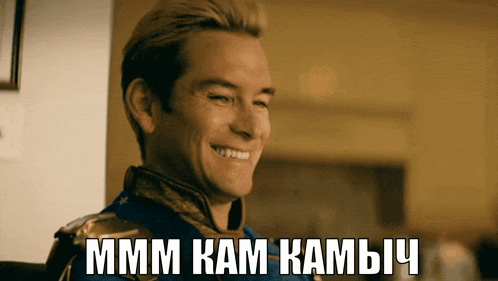 a man is smiling with a caption that says ' mmmm kam kam '
