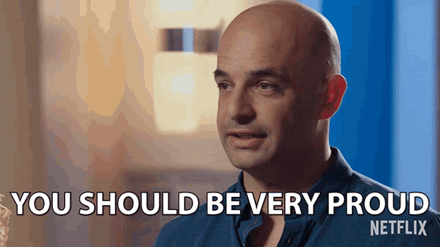 a bald man says " you should be very proud " in front of a netflix logo