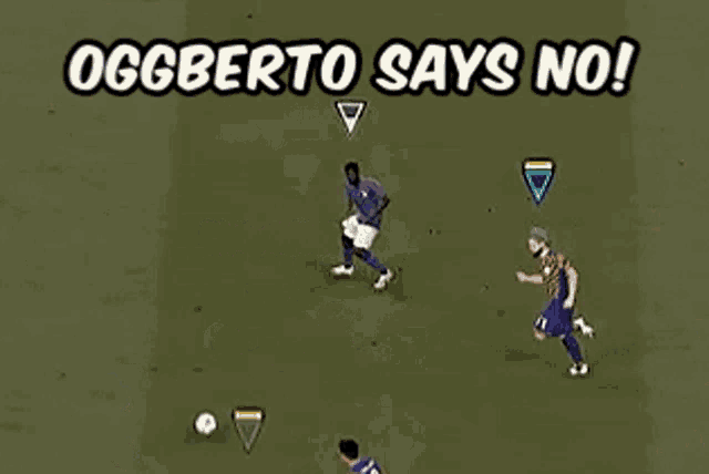 a soccer game is being played and the player 69 is laying on the ground