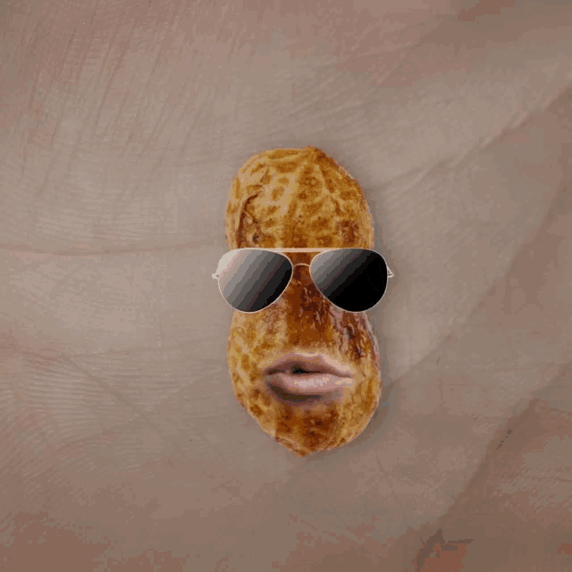 a peanut wearing sunglasses and a yellow hair