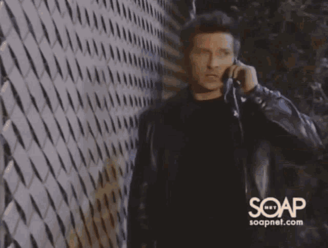 soapnet.com shows a man playing with a baby and a young boy