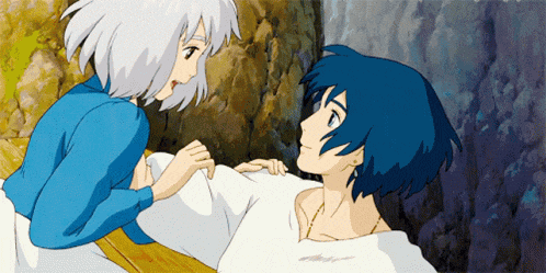 a boy and a girl are looking at each other in a scene from howl 's moving castle