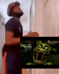 a man standing next to a picture of a cartoon character