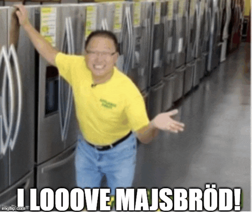 a man in a yellow shirt is standing in front of a row of fridges with the caption i looove majsbröd