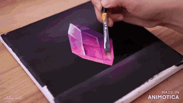a person is painting a purple object on a canvas with the words made in animotica on the bottom right
