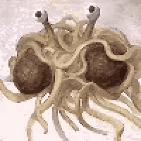 a close up of a spaghetti monster with googly eyes on a white background .