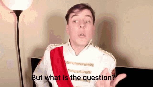 a man in a white jacket and red sash says but what is the question