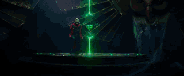 a person is holding a large green crystal in their hands