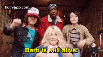a group of young people are standing next to each other and one of them is saying `` barb is still alive ! ''