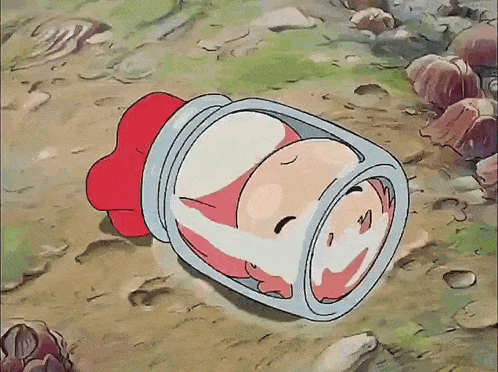 a cartoon character in a jar with a red bow