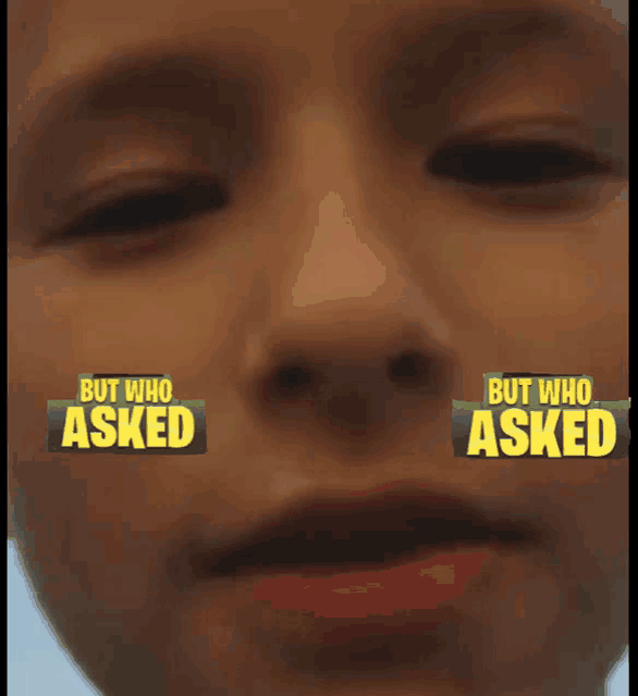 a close up of a child 's face with the words but who asked on his face