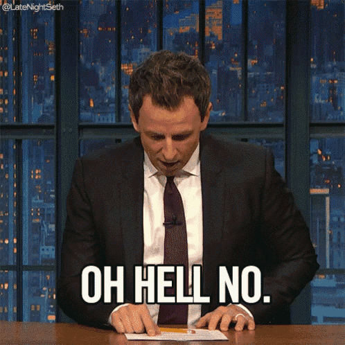 a man in a suit and tie is saying oh hell no.