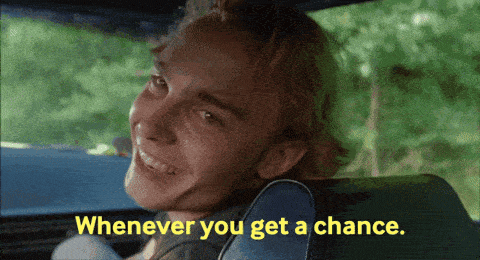 a man in a car with the words whenever you get a chance behind him