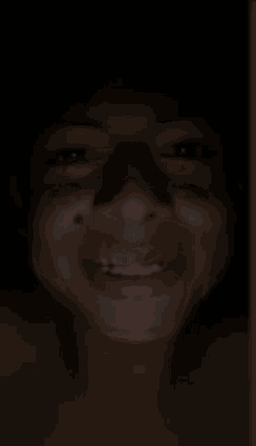 a close up of a person 's face with braces on their teeth