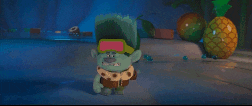 a troll is standing in front of a microphone