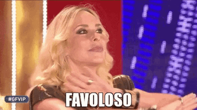 a woman is making a funny face and says favoloso