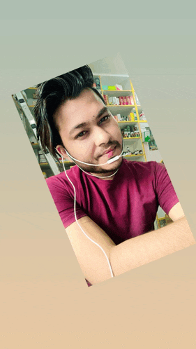 a man wearing a headset and a purple shirt
