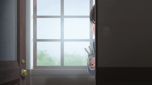 a person standing in front of a window holding a pencil