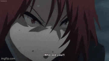 a close up of a person 's face with a very angry expression .