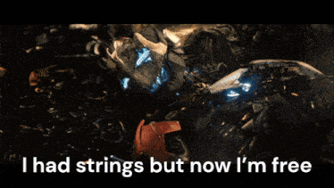 a picture of a broken robot with the words i had strings but now i 'm free