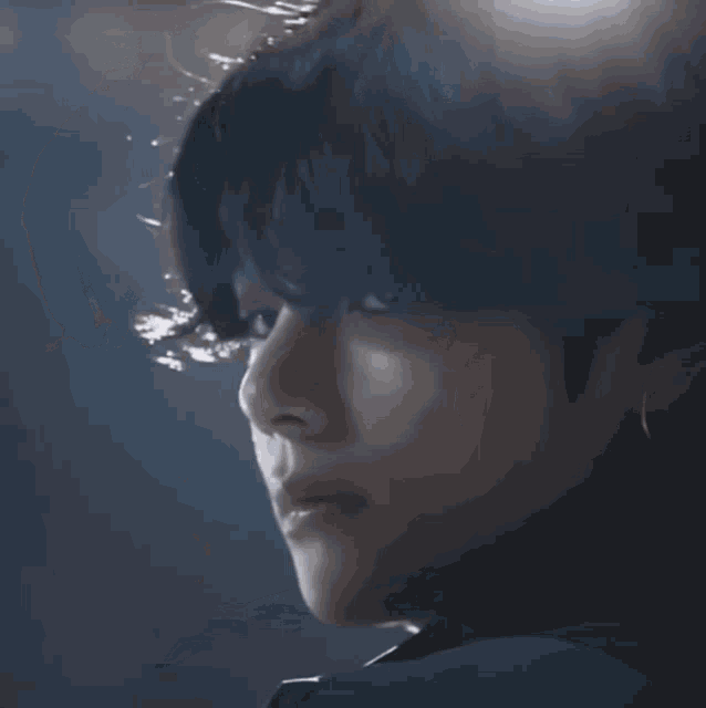 a close up of a person with dark hair