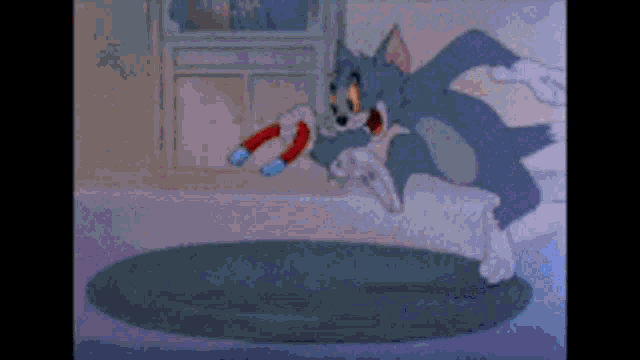 a cartoon of tom and jerry with a magnet in its mouth