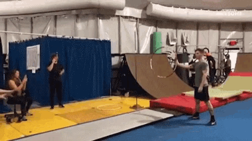 Gymnastics Trick Through The Hoop GIF - Gymnastics Trick Through The Hoop Flips GIFs