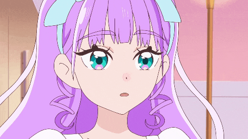 a close up of a girl with purple hair