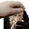 a hand is holding a piece of paper over a woman 's head