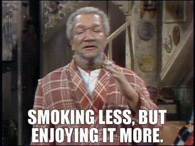 a man in a plaid robe is saying smoking less but enjoying it more