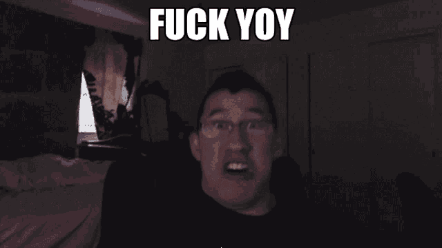 a close up of a person 's face with the words " fuck yoy " written on it
