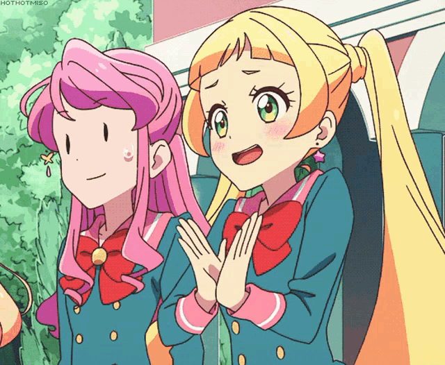 two anime girls are standing next to each other with their hands folded in front of their faces