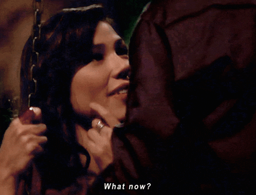 a man and a woman are looking into each other 's eyes and the man is saying " what now "
