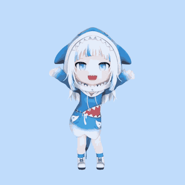 a little girl is wearing a shark costume and dancing