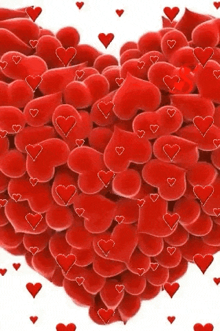 a pile of red hearts shaped like a heart on a white background .