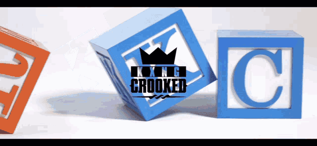 a blue block with a crown on it has the word crooked on it