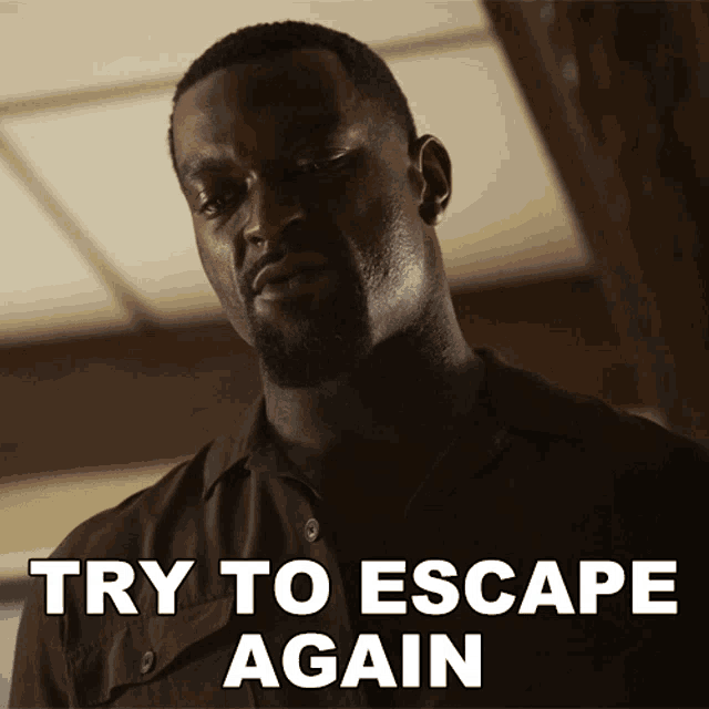a man with a beard is standing in front of a sign that says " try to escape again "