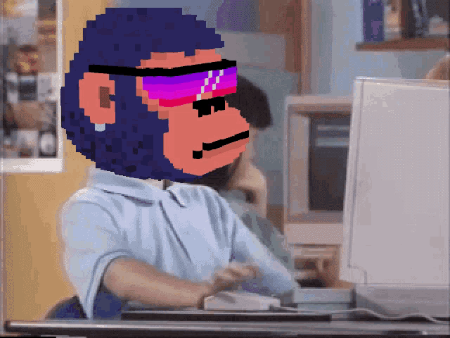a pixel art of a gorilla wearing sunglasses sitting at a desk