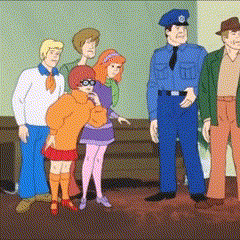 a group of scooby doo characters standing next to each other