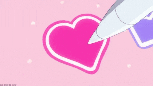 a pen is drawing a heart on a pink background .